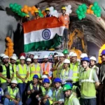 ऋषिकेश-कर्णप्रयाग रेल परियोजना में ऐतिहासिक उपलब्धि, निकास सुरंग आर-पार… तिरंगा लेकर मनाई खुशी